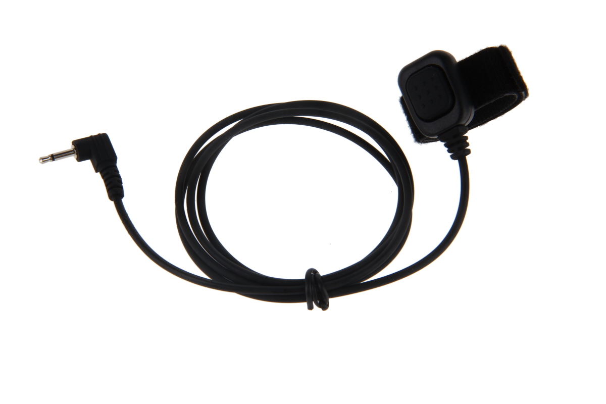 CoPacks negro PTT de dedo con botón de intercomunicación, conectado mediante un cable negro con conector jack de 2,5 mm. Unidad PTT con cinta de velcro para su fijación, ideal para auriculares. Cable de 100 mm, ligeramente enrollado.