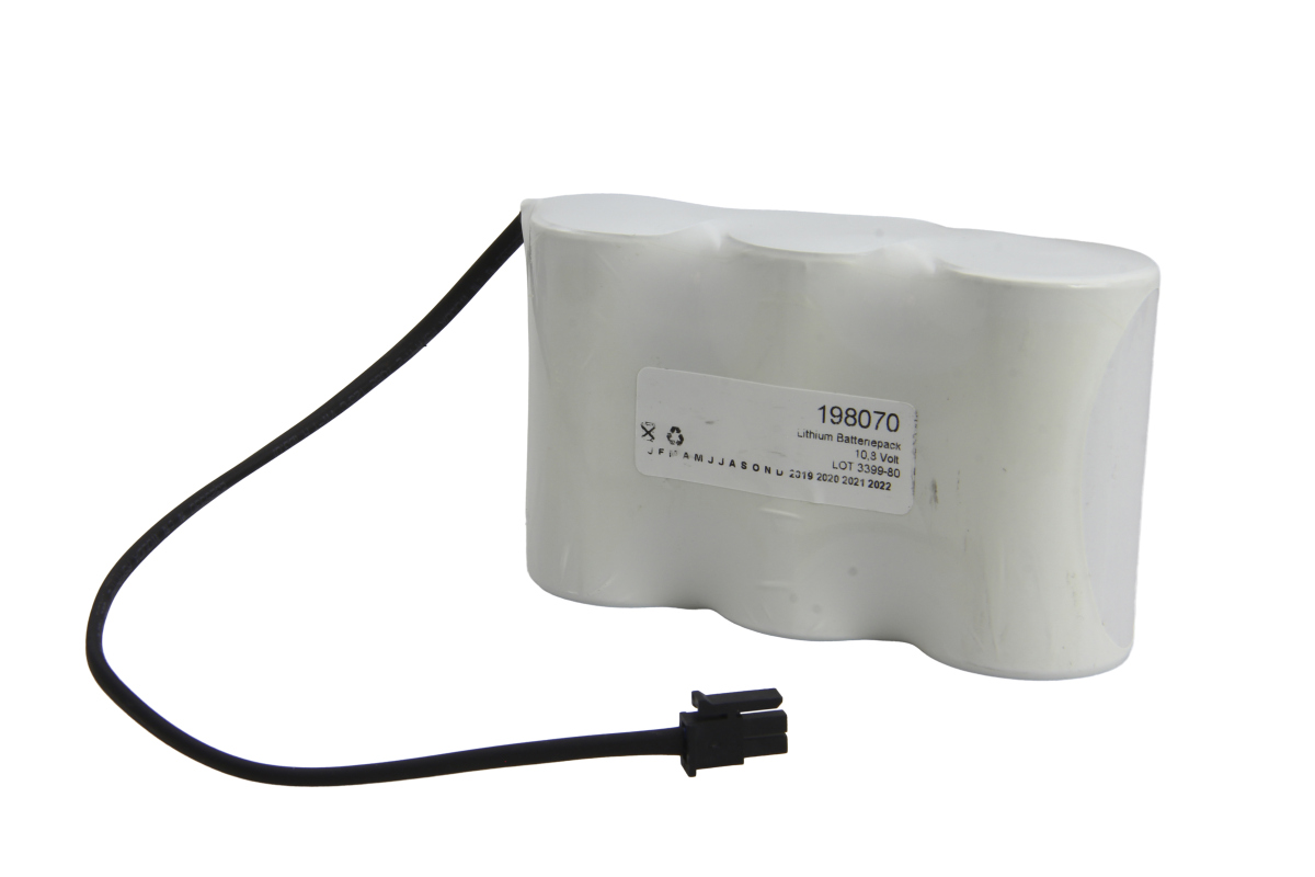 White lithium battery pack for the ABB Robotics LS33600, positioned diagonally, with a black cable and plug. Cylindrical module wrapped in foil, label: ‘Lithium battery pack 10.8 volts’. Plug visible at the bottom.
