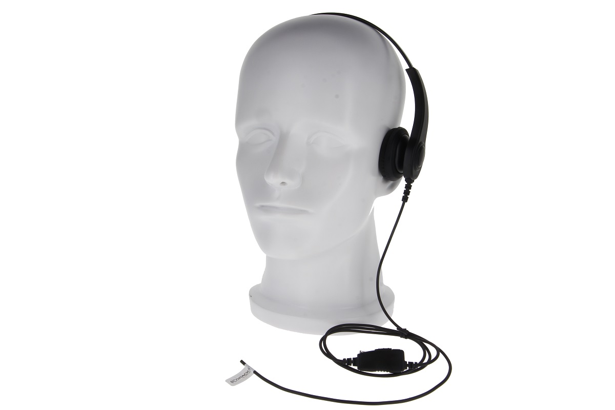 Auriculares negros « CoPacks » GES-H01 sin micrófono de cuello de cisne sobre una cabeza de maniquí blanca. Un solo auricular en la oreja derecha, diadema fina que cruza la cabeza. Cable con botón PTT y etiqueta « CoPacks », para Motorola CLP446.