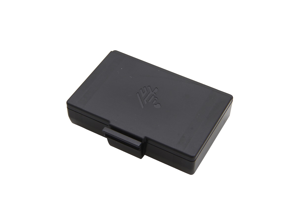 A black, rectangular Li-ion battery with slightly rounded edges rests on a white background. At the top is a subtle, raised ‘ Zebra ’ logo. On one side is a small, rectangular clip. Sturdy and compact.