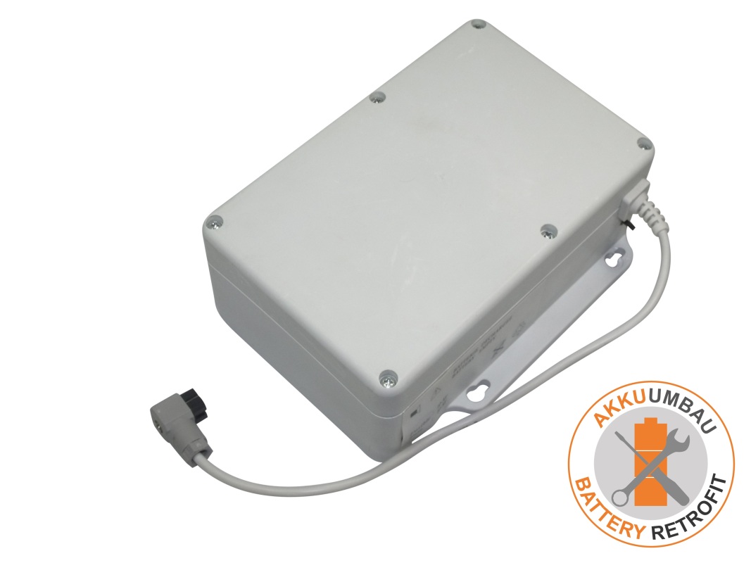 Rectangular, light grey module for battery conversion, for hospital beds such as Hill Rom. Smooth surface with four screws and a white cable outlet, which ends in a grey angled plug. Replacement or conversion unit.