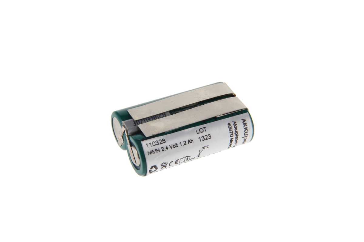 Green NiMH battery pack consisting of two cylindrical cells placed side by side, connected by silver metal strips. White lettering: ‘NIMH 2.4 volts 1.2 Ah’, manufacturer ‘AKKUMED ’, disposal symbols.