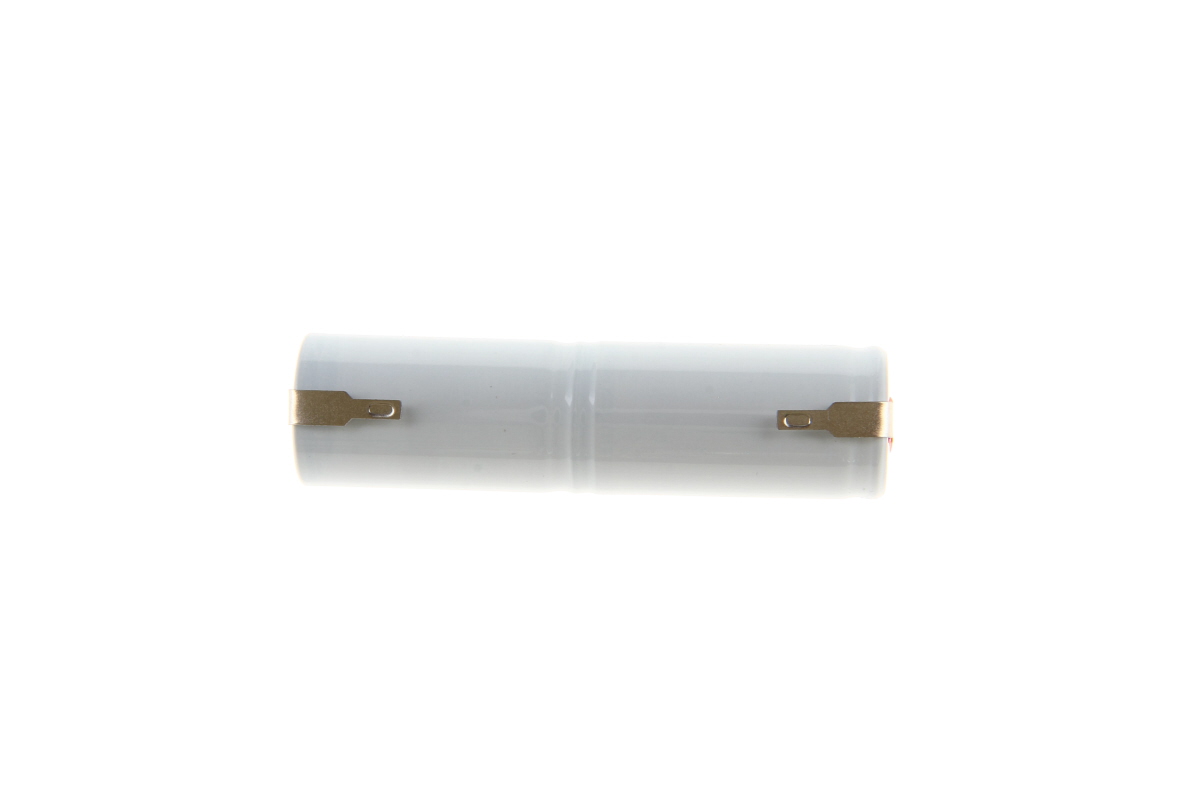Batteria NC cilindrica Sub C-Size, rivestita in termoretraibile grigio chiaro, con connettore Faston da 2,8 mm su entrambe le estremità. Batteria CoPacks per illuminazione di emergenza e sicurezza.