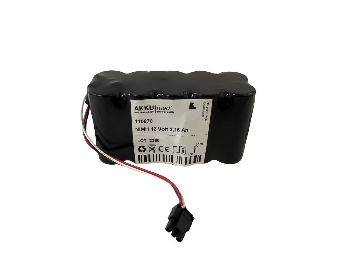 Black, rectangular ‘ AKKUMED ’ NiMH battery with rounded corners and a white label. Imprinted with: ‘NiMH 12 Volt 2.15 Ah’ and identification code. Red and white cable with a black plug. Replacement for the Criticare Poet IQ2 CO₂ monitor.