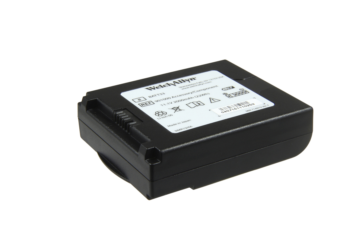 Black lithium-ion battery with a white label: Manufacturer Welch Allyn, model BATT33, ref. 901000, specifications 11.1 V, 2000 mAh. One side has a ribbed texture. Warning symbols and barcode are visible.