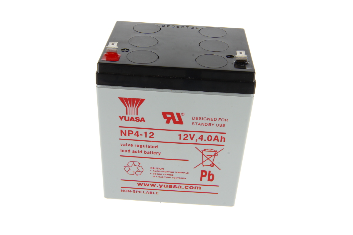 Yuasa ’s grey NP4-12 lead-acid battery with a black top and red lettering. Valve-regulated, 12V, 4.0Ah for standby applications. Two metal terminals on top, positive terminal marked in red. Warning and disposal symbols on the front.