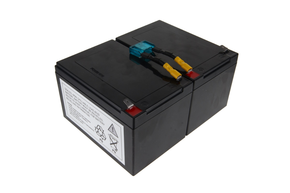 Two black rectangular replacement battery packs for the APC RBC6, side by side. Connected on top by a transparent blue fuse holder with yellow-insulated cables. Left pack has a white label with warnings, recycling symbols and ‘Pb’.
