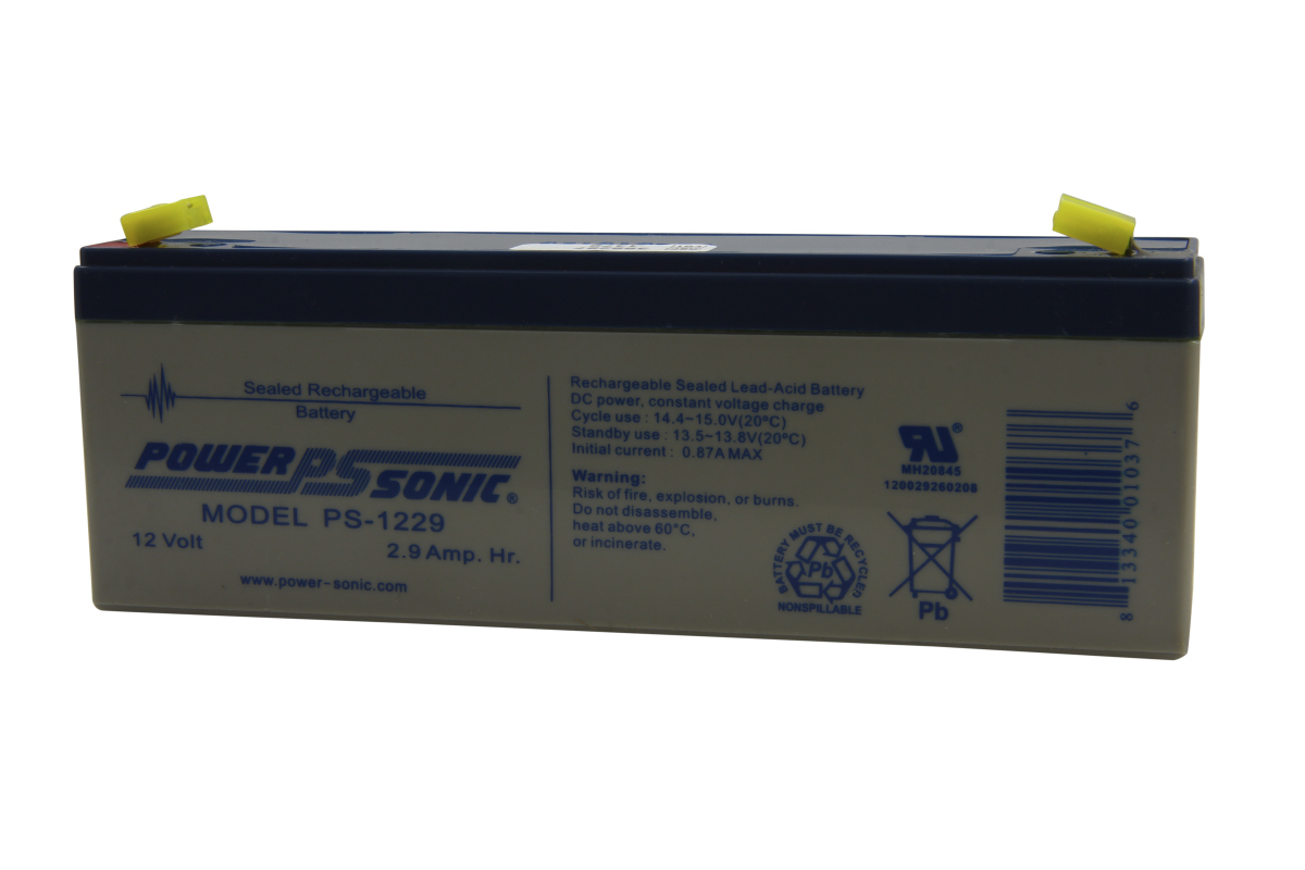 Grauer, rechteckiger Powersonic Blei-Vlies Akku mit dunkelblauem Deckel und gelben Schutzkappen. Vorn steht "POWER PS SONIC", Modell "PS-1229", "12 Volt" und "2.9 Amp. Hr."; weitere Beschriftungen und Barcode sichtbar.