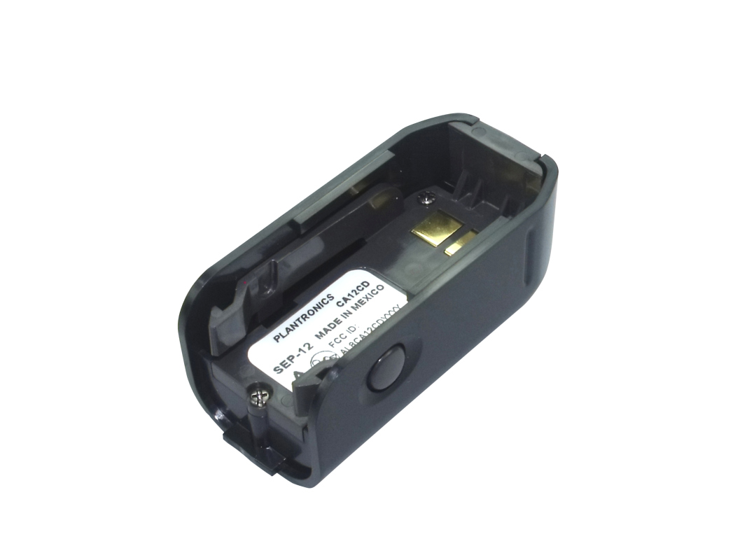 Black, oblong battery with an open top, visible internal components and gold-coloured contacts. White label: ‘Plantronics CA12CD’, ‘MADE IN MEXICO’. Round black button on the side. Li-ion, suitable for Plantronics CA12CD.