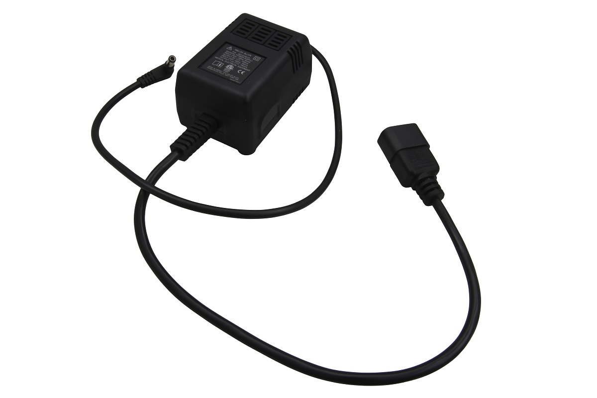 Black Welch Allyn power supply unit 503-0148-01 on a white background. With an output cable and a small, angled hollow plug, as well as a short input cable with a C13 socket. Rectangular housing with ventilation slots and labelling.