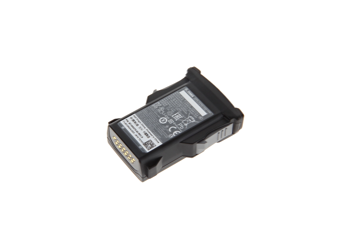 Batería de iones de litio negra «Zebra» para MC9300, rectangular con detalles grises laterales. Arriba, etiqueta blanca con datos del fabricante y especificaciones (tensión, capacidad). En un extremo, pines dorados de contacto.