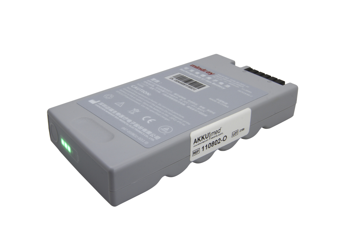 Mindray Batería de iones de litio gris para ecógrafos Mindray, con 3 indicadores de carga verdes y logotipo. Rectangular, con inscripciones laterales, contactos negros y base ondulada. Compatible con DP-10VET, DP-20 y DP-30.